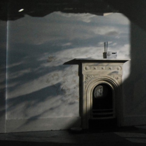 Projection of the camera obscurer (what's outside the space) onto the walls of Kate's studio space showing clouds moving across the sky