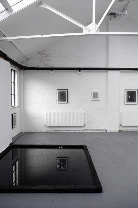 The River Garage Studio exhibition space shows wall-mounted photograms