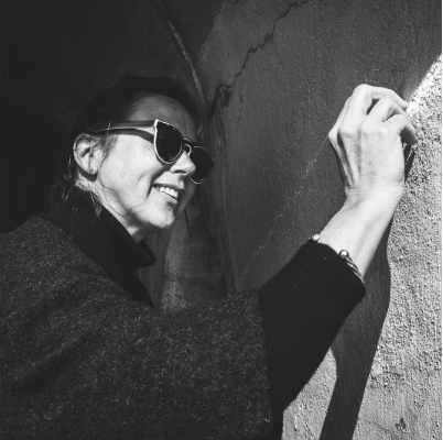 Portrait of Kate writing on the archway walls of Sunny Sands beach