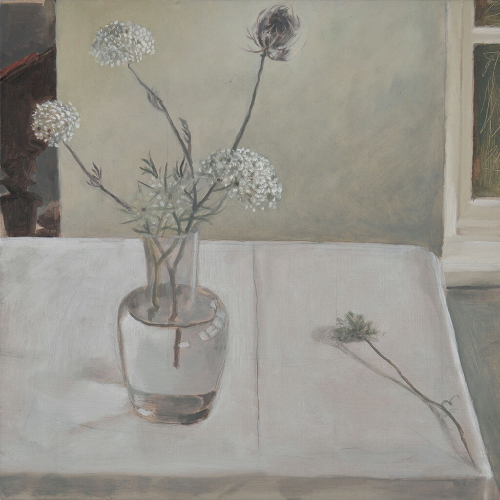 Oil painting of white speckled flowers in a glass water jug on a white table cloth in a calm green interior. One flower is lying next to the jug and castes a shadow onto the white surface.