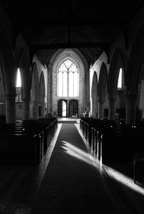 Black and white photo of the interior of All Saints Church